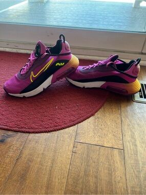 Nike Kids Fuchsia Air Max in Fuchsia with Yellow and Orange Accents